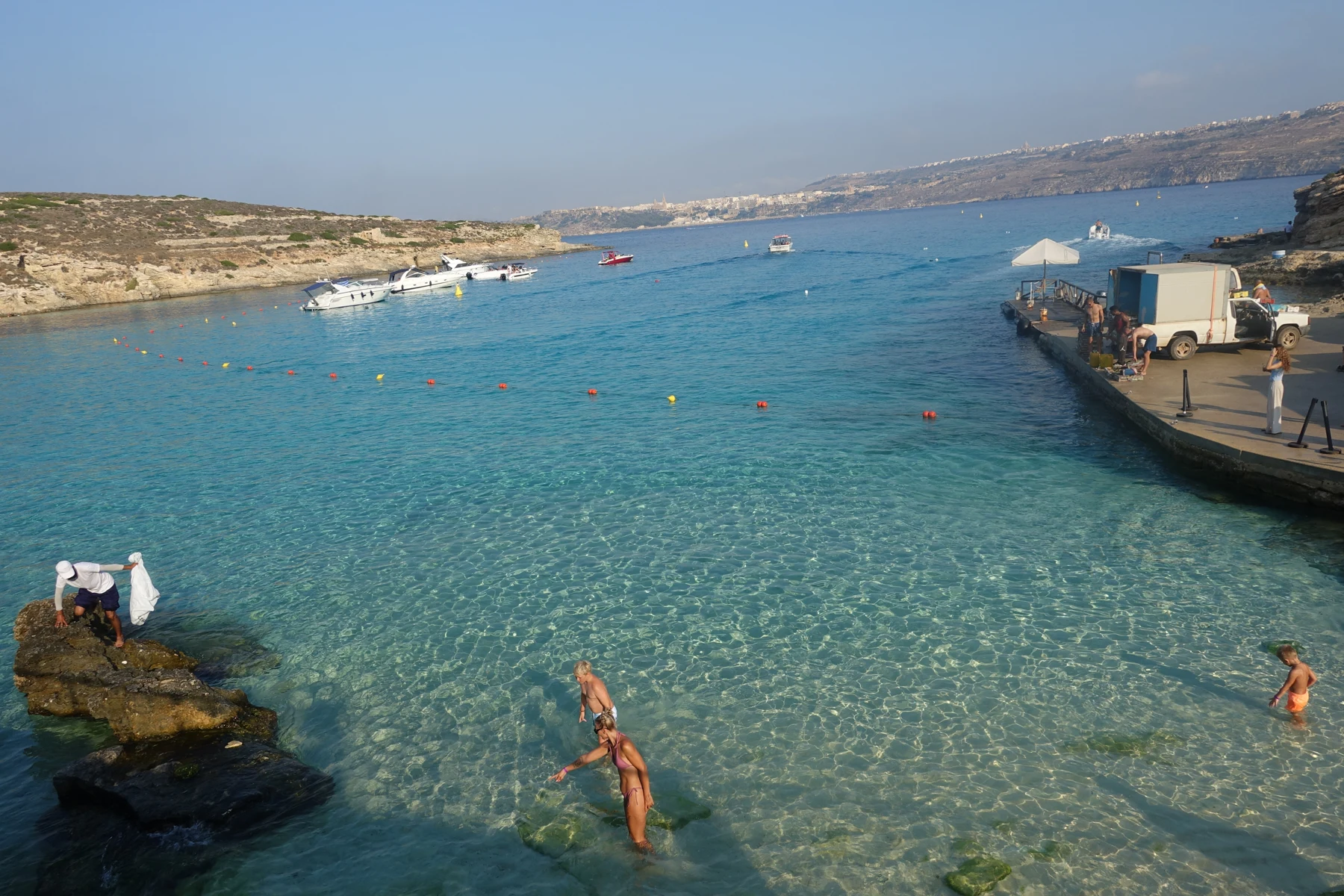 Visitors enjoying the Blue Lagoon on Comino.
